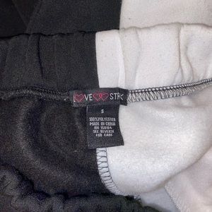 Black && white multi colored sweatpants, size small.